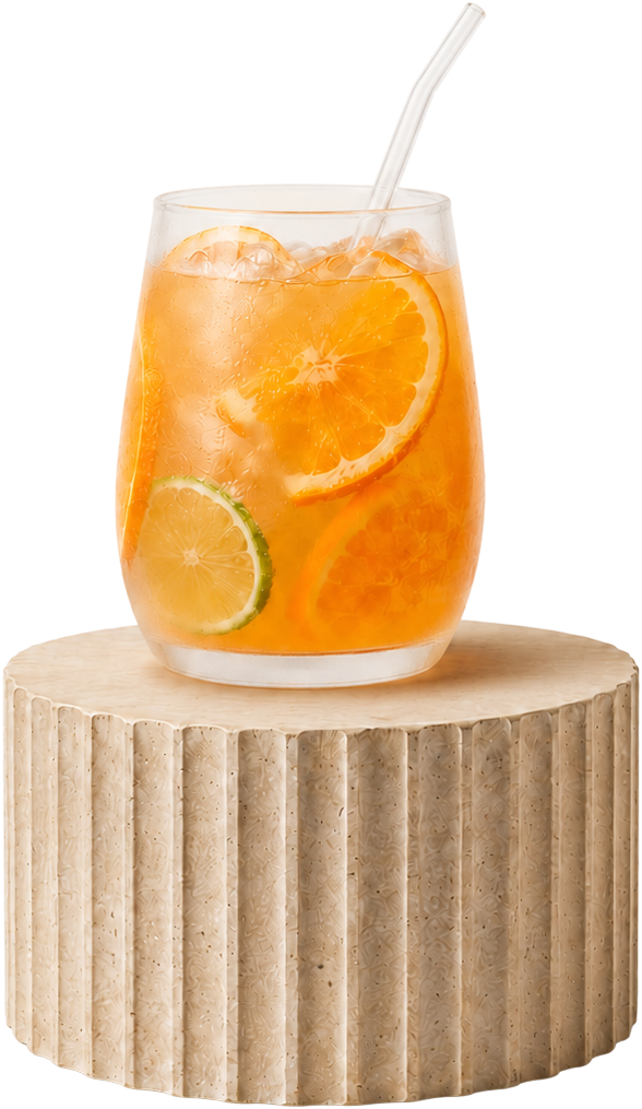 Iced citrus drink on a fluted stone podium